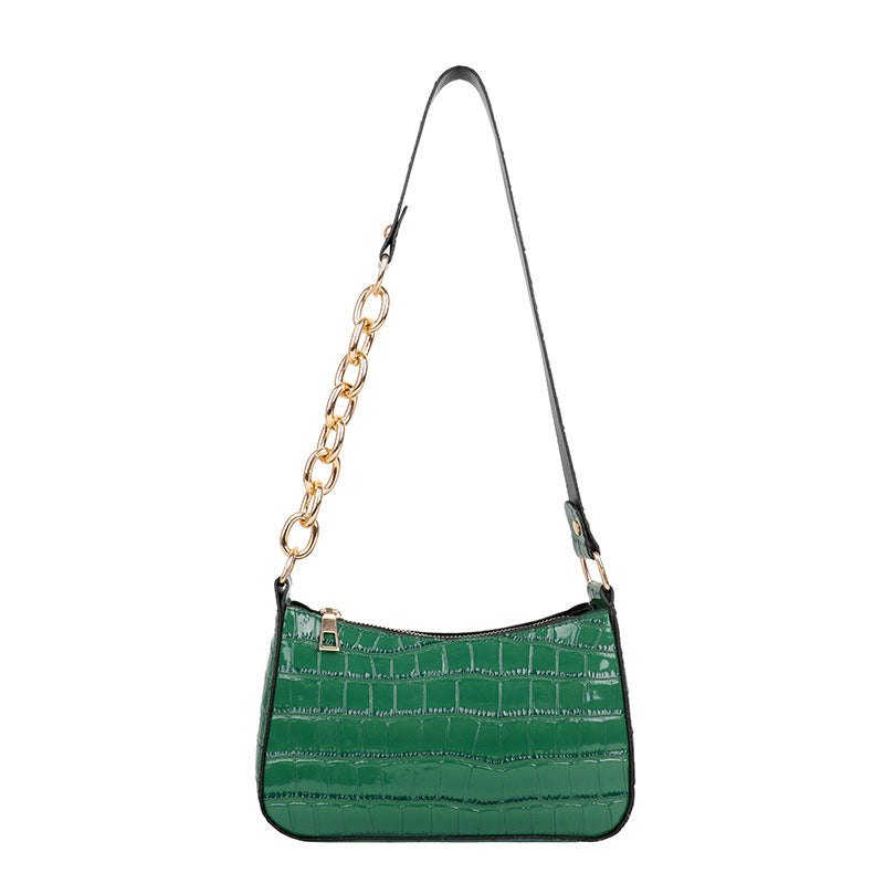 Alligator pattern lady's chain shoulder bag in medium size with a zipper closure and single strap.