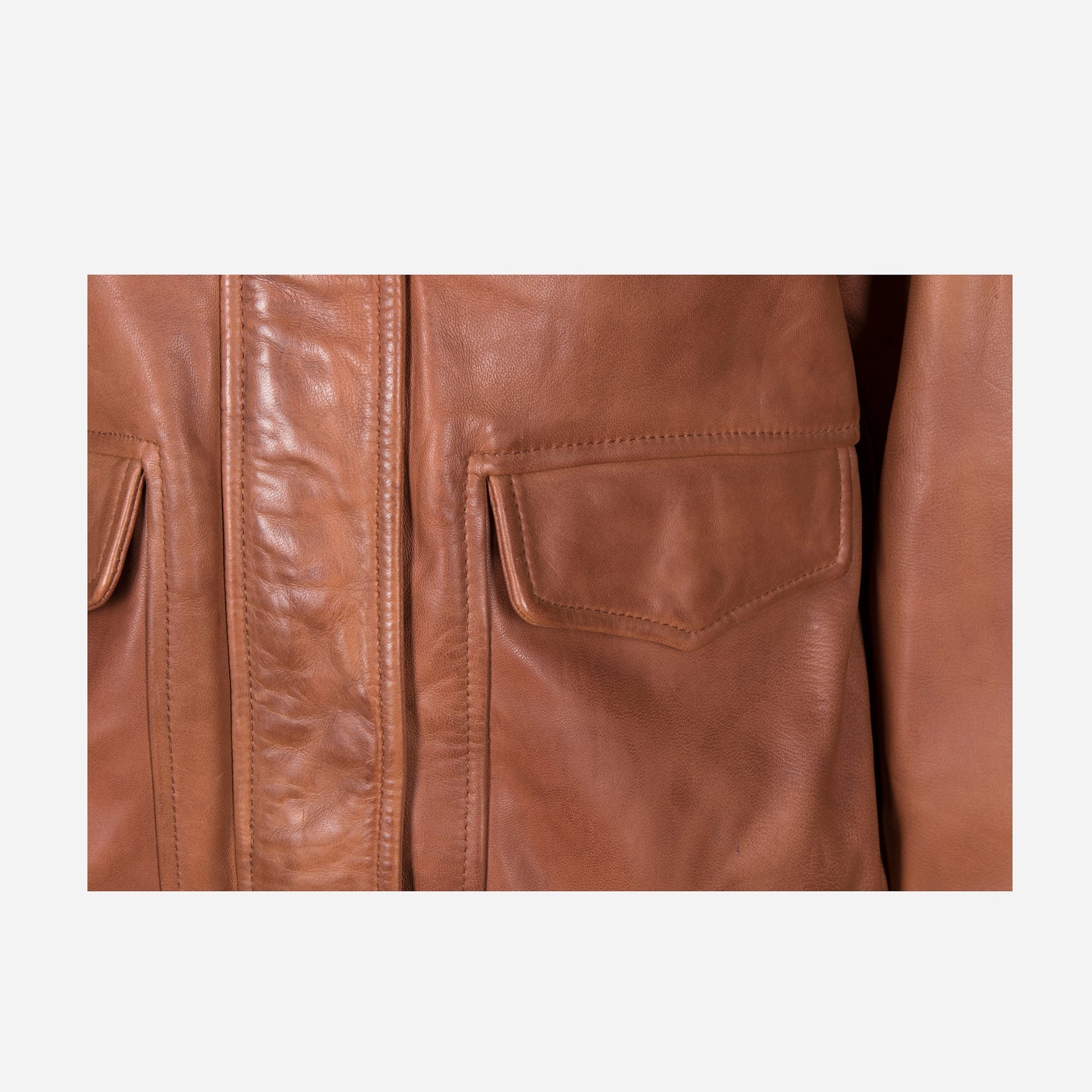 Amanda Bomber Jacket in Chestnut, showcasing its genuine leather material and stylish design.