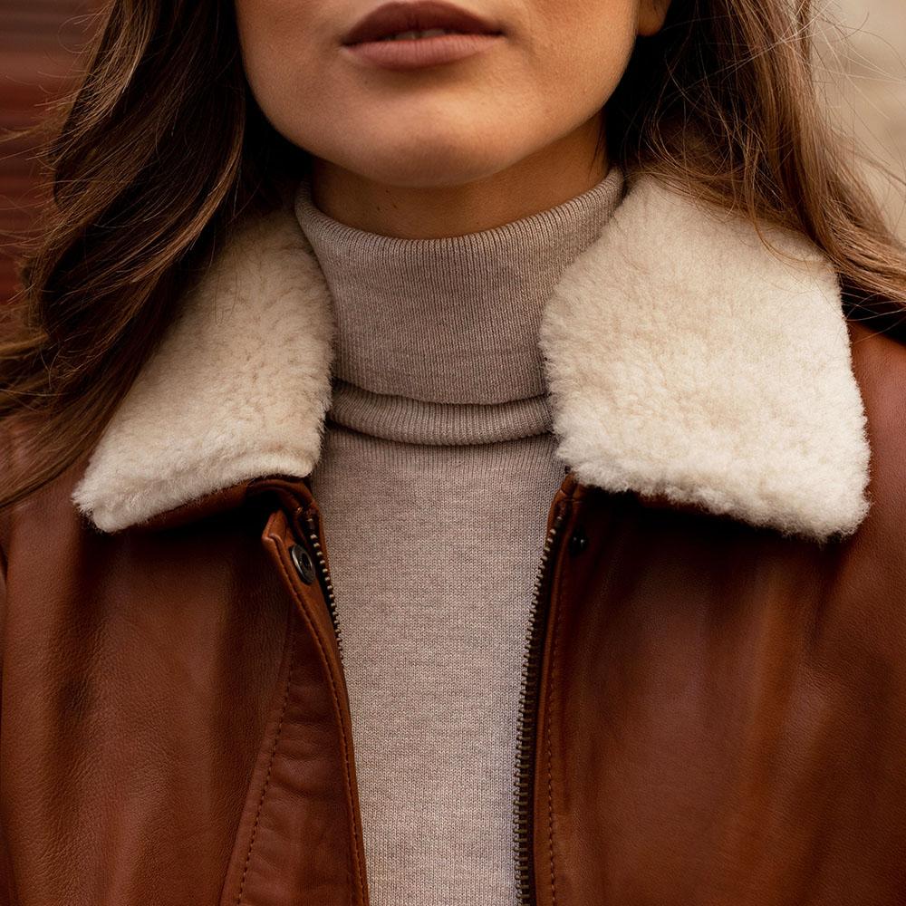 Amanda Bomber Jacket in Chestnut, showcasing its genuine leather material and stylish design.