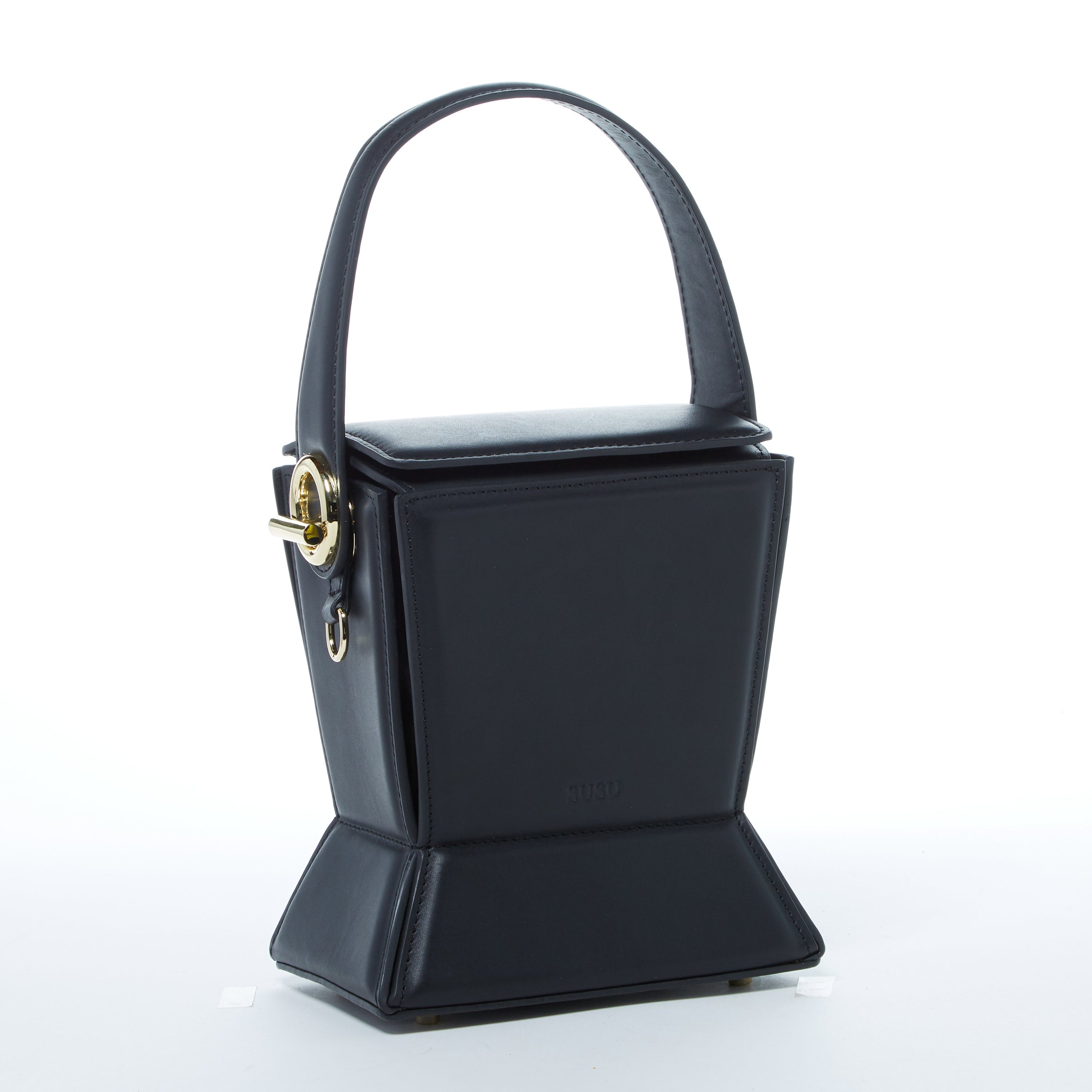 Amber Leather Bucket Purse in black with geometric design, gold hardware, and coffee cotton lining, showcasing its stylish and functional features.