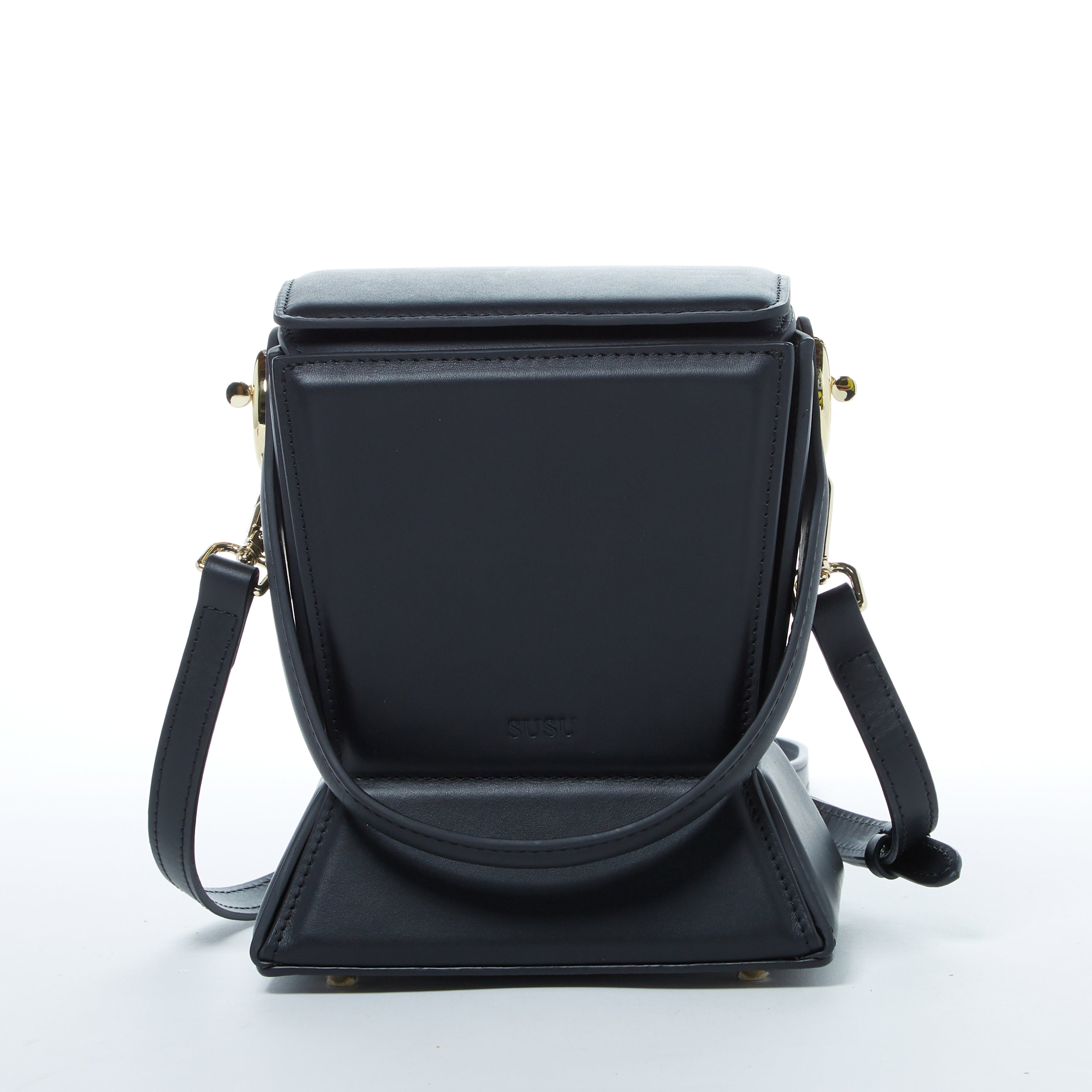 Amber Leather Bucket Purse in black with geometric design, gold hardware, and coffee cotton lining, showcasing its stylish and functional features.