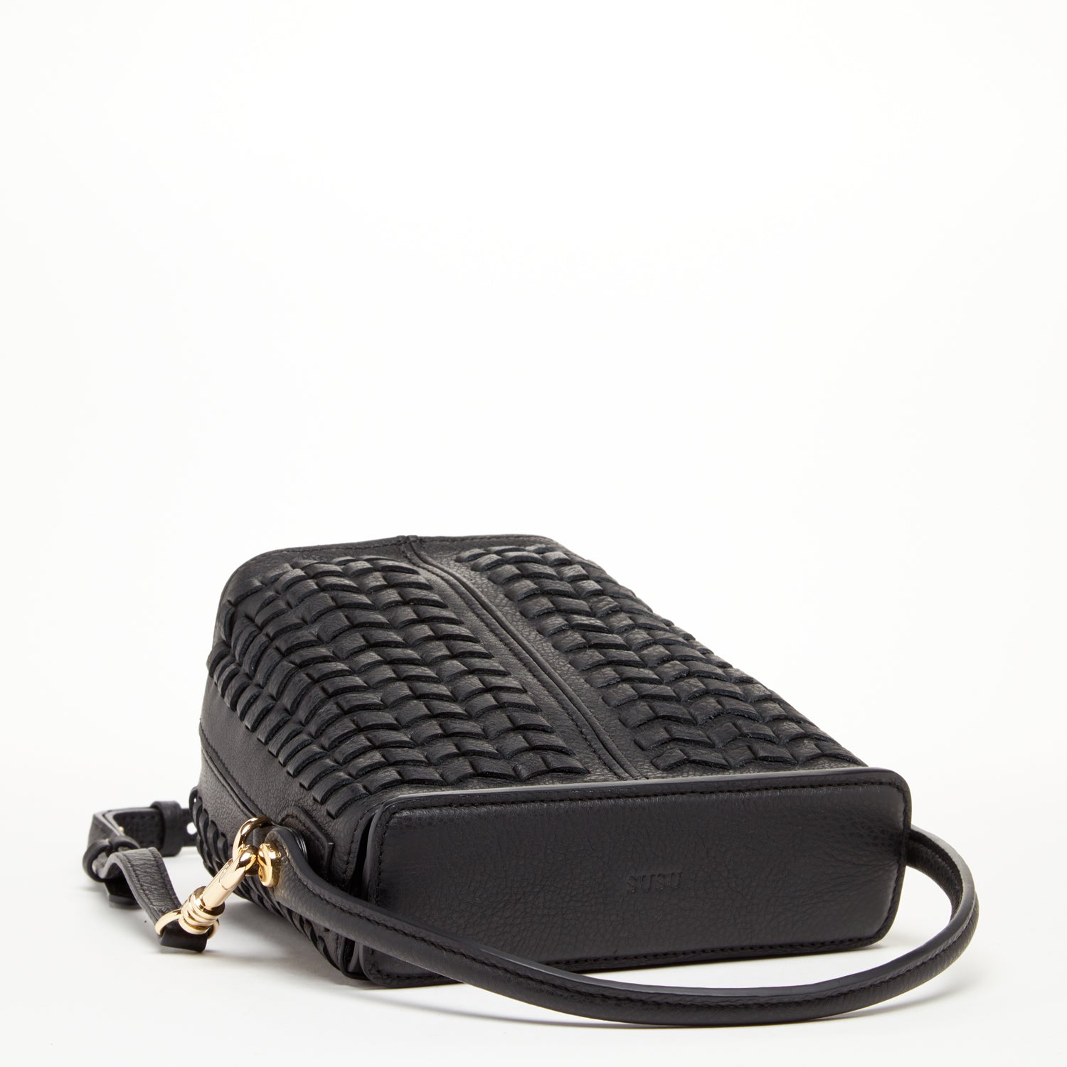 Anna Woven Leather Bag in Black with basket weave design, featuring adjustable strap and teal interior.