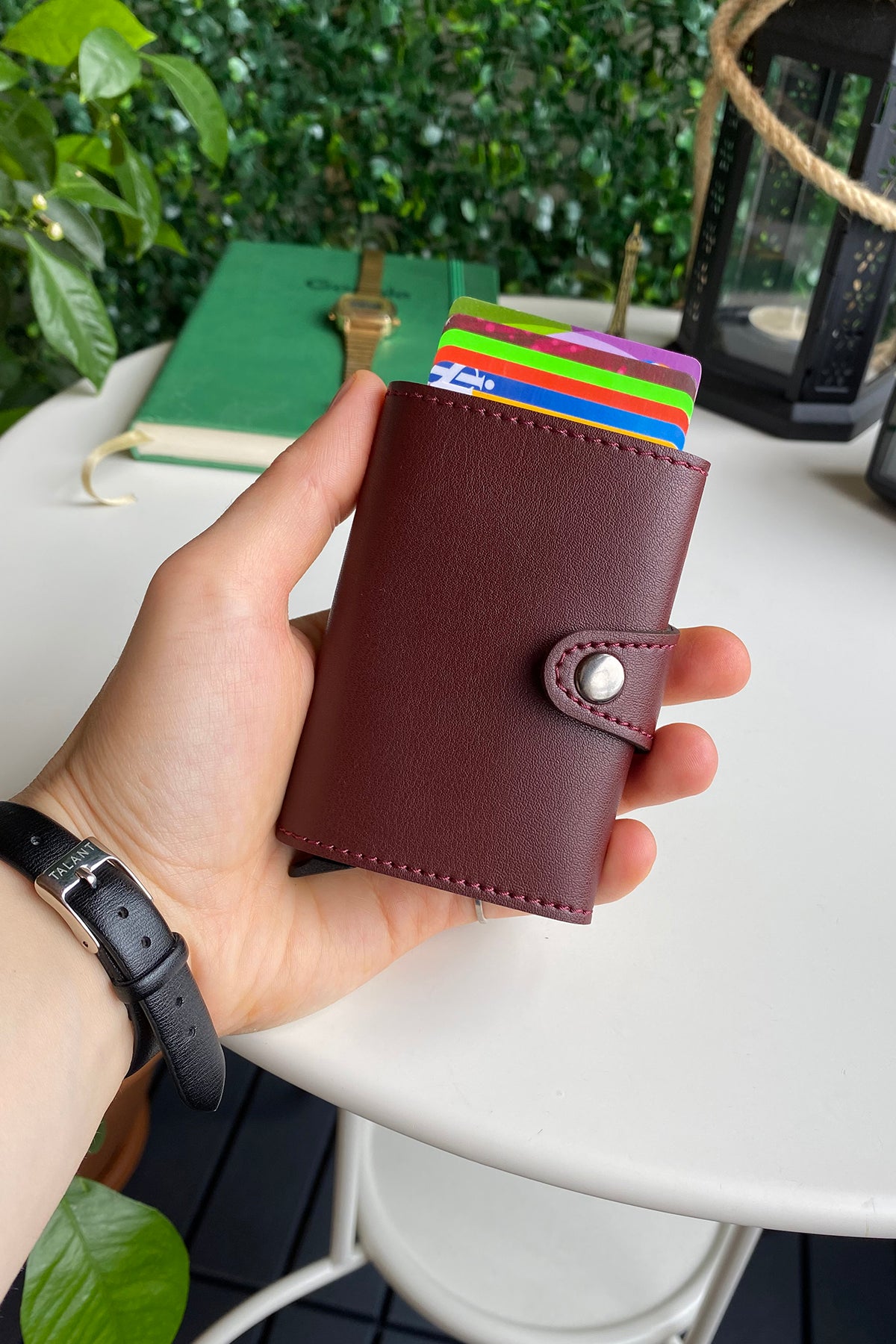 Angora Vegan Leather RFID Mechanism Card Holder in burgundy, navy, and black, showcasing its sleek design and pop-up card feature.