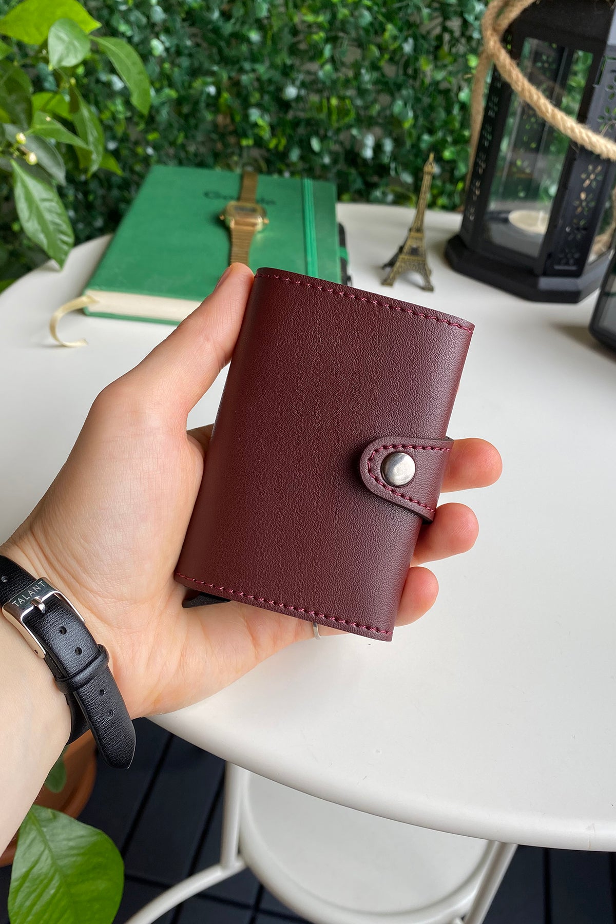 Angora Vegan Leather RFID Mechanism Card Holder in burgundy, navy, and black, showcasing its sleek design and pop-up card feature.