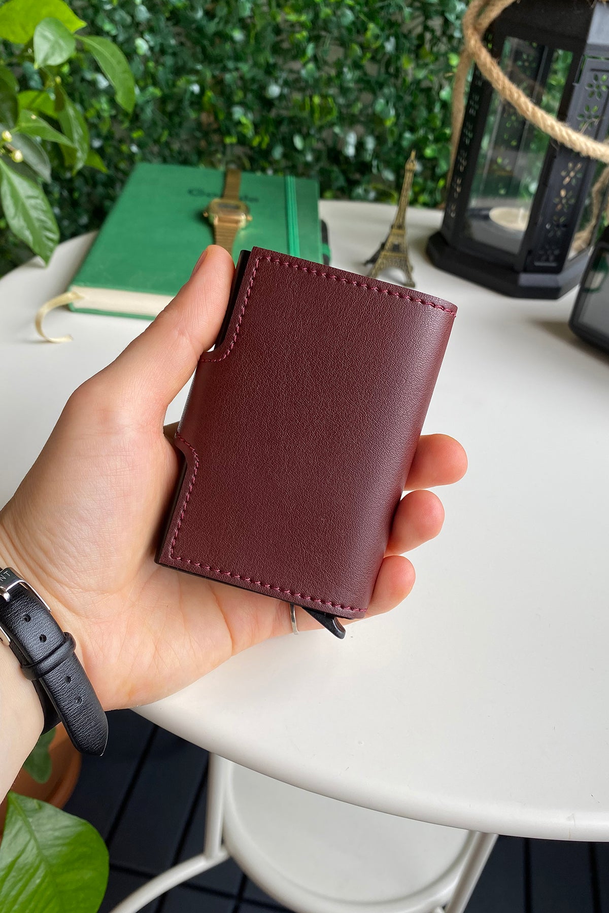 Angora Vegan Leather RFID Mechanism Card Holder in burgundy, navy, and black, showcasing its sleek design and pop-up card feature.