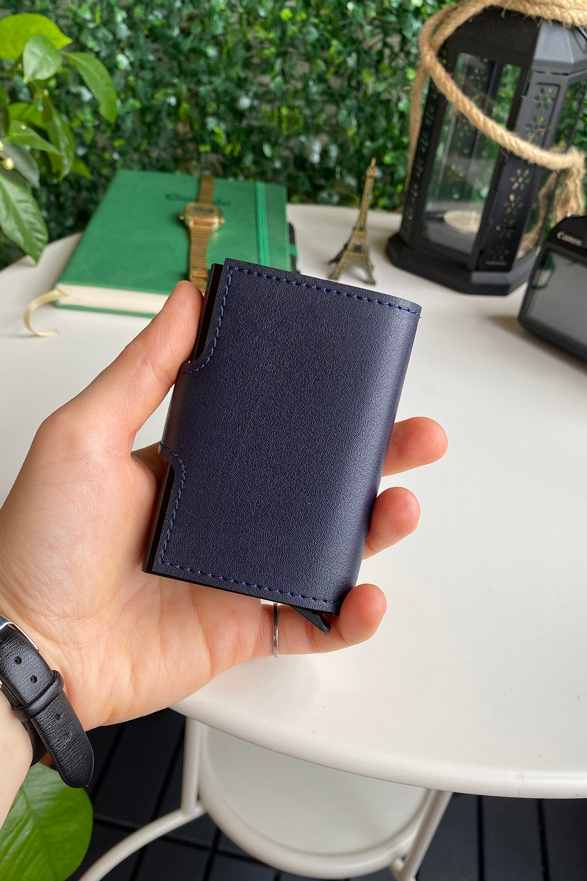 Angora Vegan Leather RFID Mechanism Card Holder in burgundy, navy, and black, showcasing its sleek design and pop-up card feature.