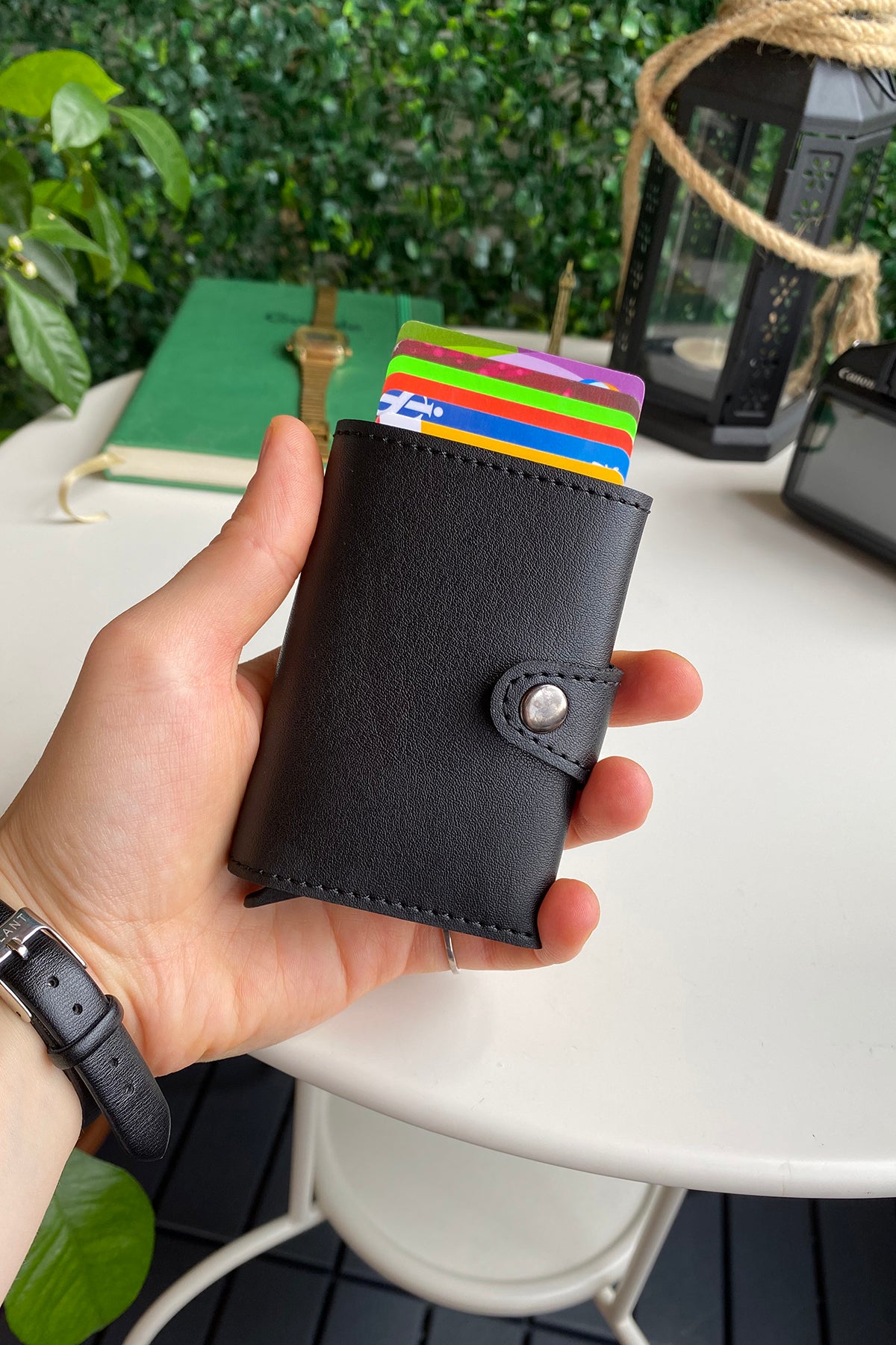 Angora Vegan Leather RFID Mechanism Card Holder in burgundy, navy, and black, showcasing its sleek design and pop-up card feature.