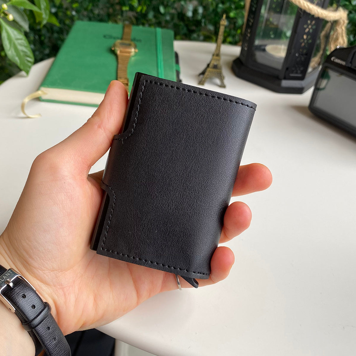 Angora Vegan Leather RFID Mechanism Card Holder in burgundy, navy, and black, showcasing its sleek design and pop-up card feature.