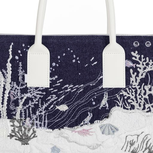 Artbook Medium - Seabed Shoulder Bag featuring unique ocean wave patterns and adjustable handle, made from vegan leather.