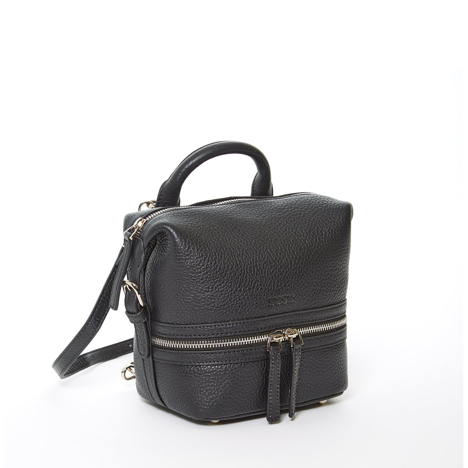 Ashley Small Black Leather Backpack featuring a sleek black exterior, red interior, and silver hardware, perfect for versatile styling.