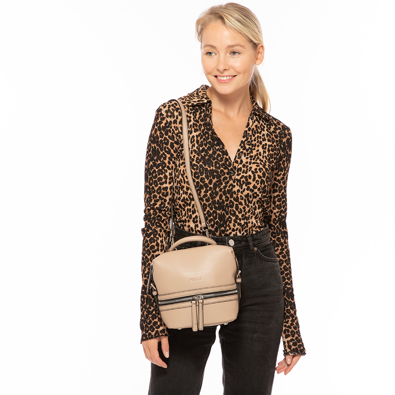 Ashley Small Leather Backpack Purse in Beige with silver zippers and leather tassels, showcasing its stylish design and practical features.