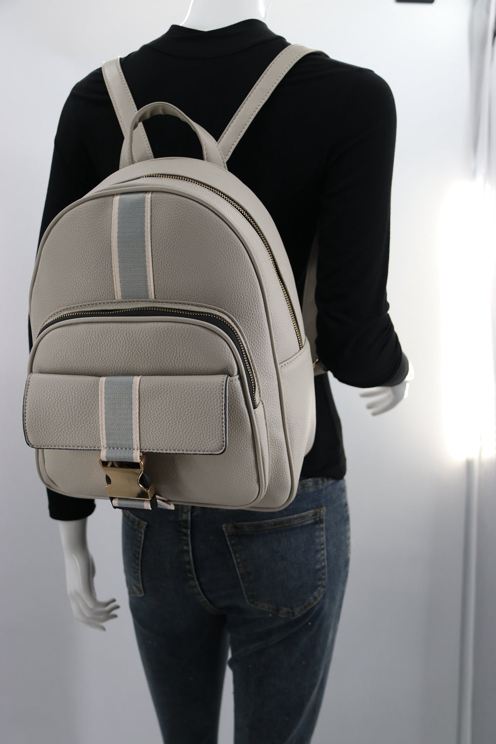 Backpack B1927 featuring a modern design with padded straps and spacious compartments.