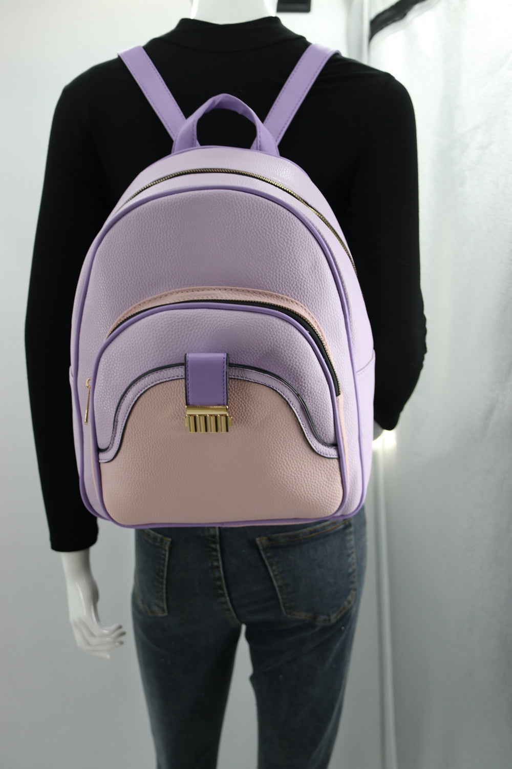 Backpack B1931 featuring a sleek design, padded straps, and spacious compartments, ideal for school and travel.