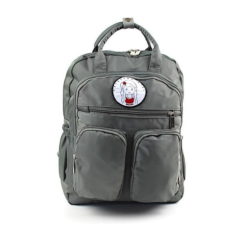 Stylish waterproof backpack for work and university with iPad pocket and multiple zipped compartments.