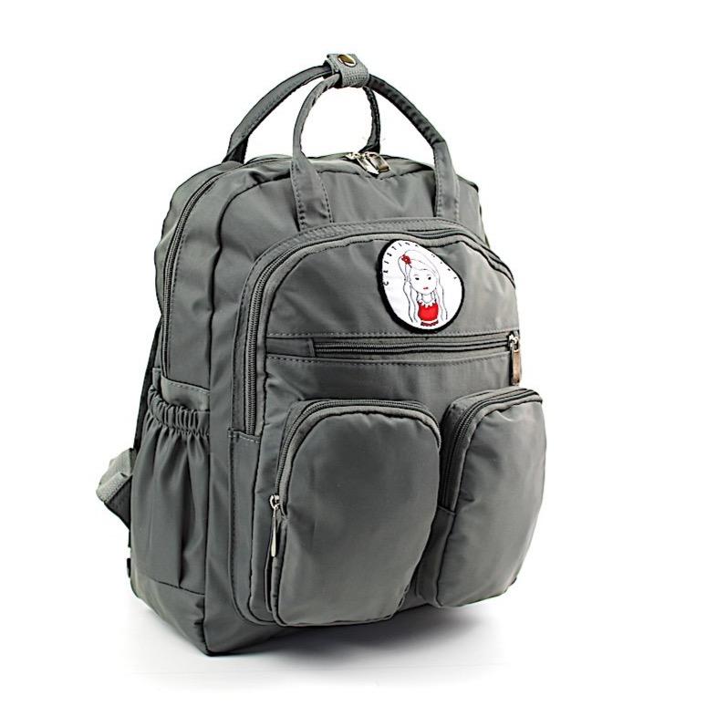 Stylish waterproof backpack for work and university with iPad pocket and multiple zipped compartments.