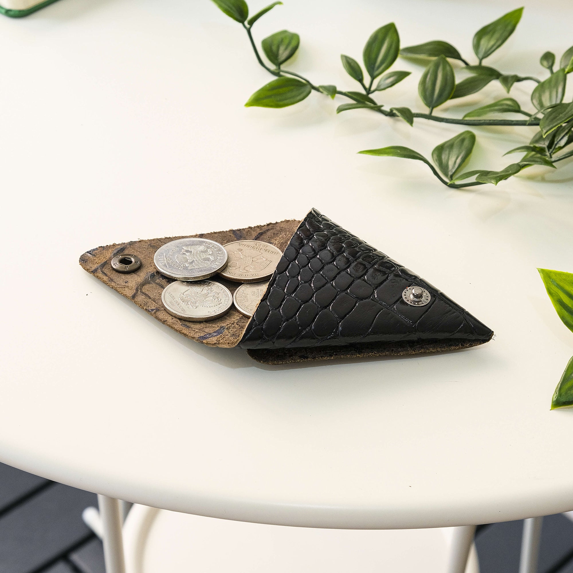 Bamby Genuine Leather Coin Pouch in various colors, showcasing its minimalist and stitchless design.