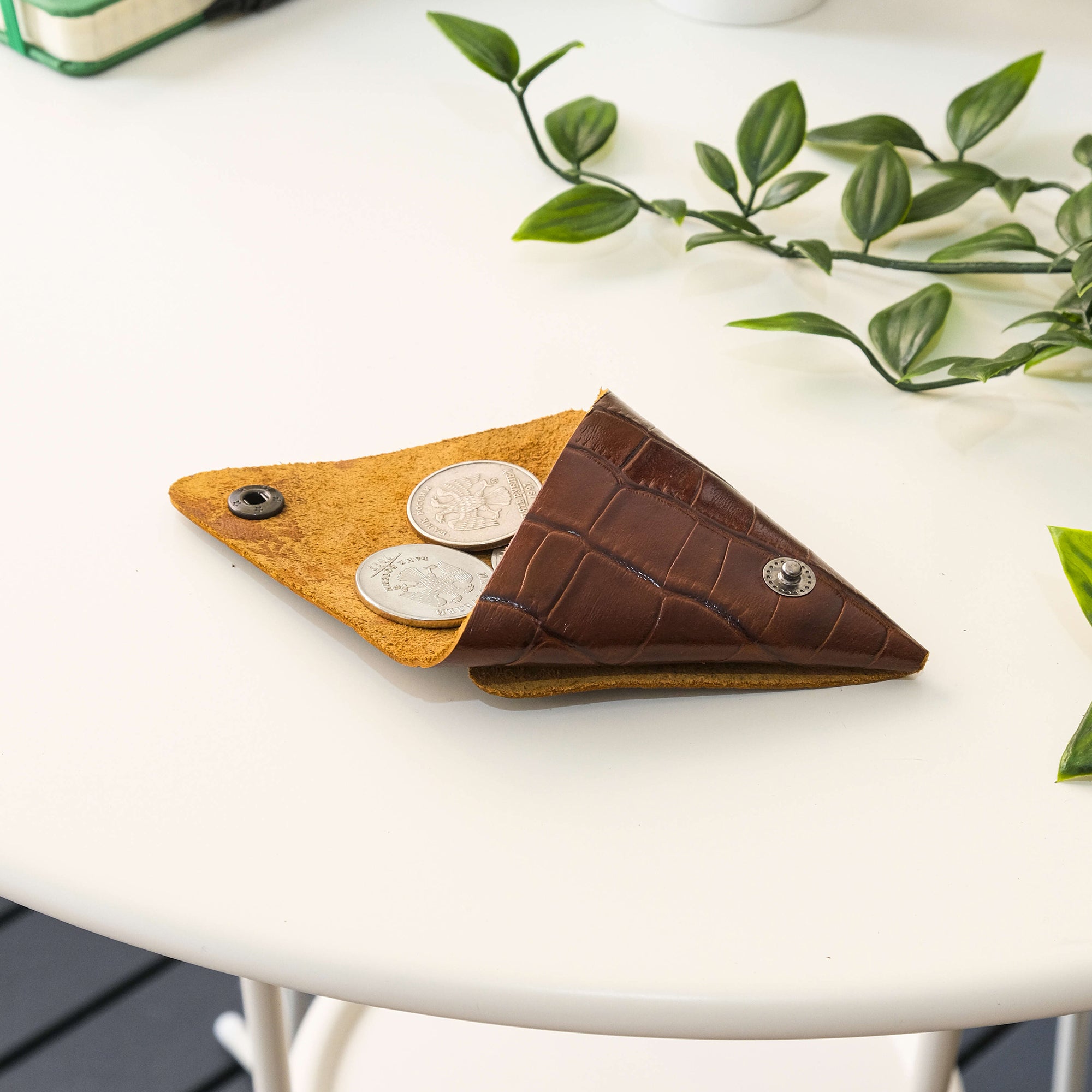 Bamby Genuine Leather Coin Pouch in various colors, showcasing its minimalist and stitchless design.