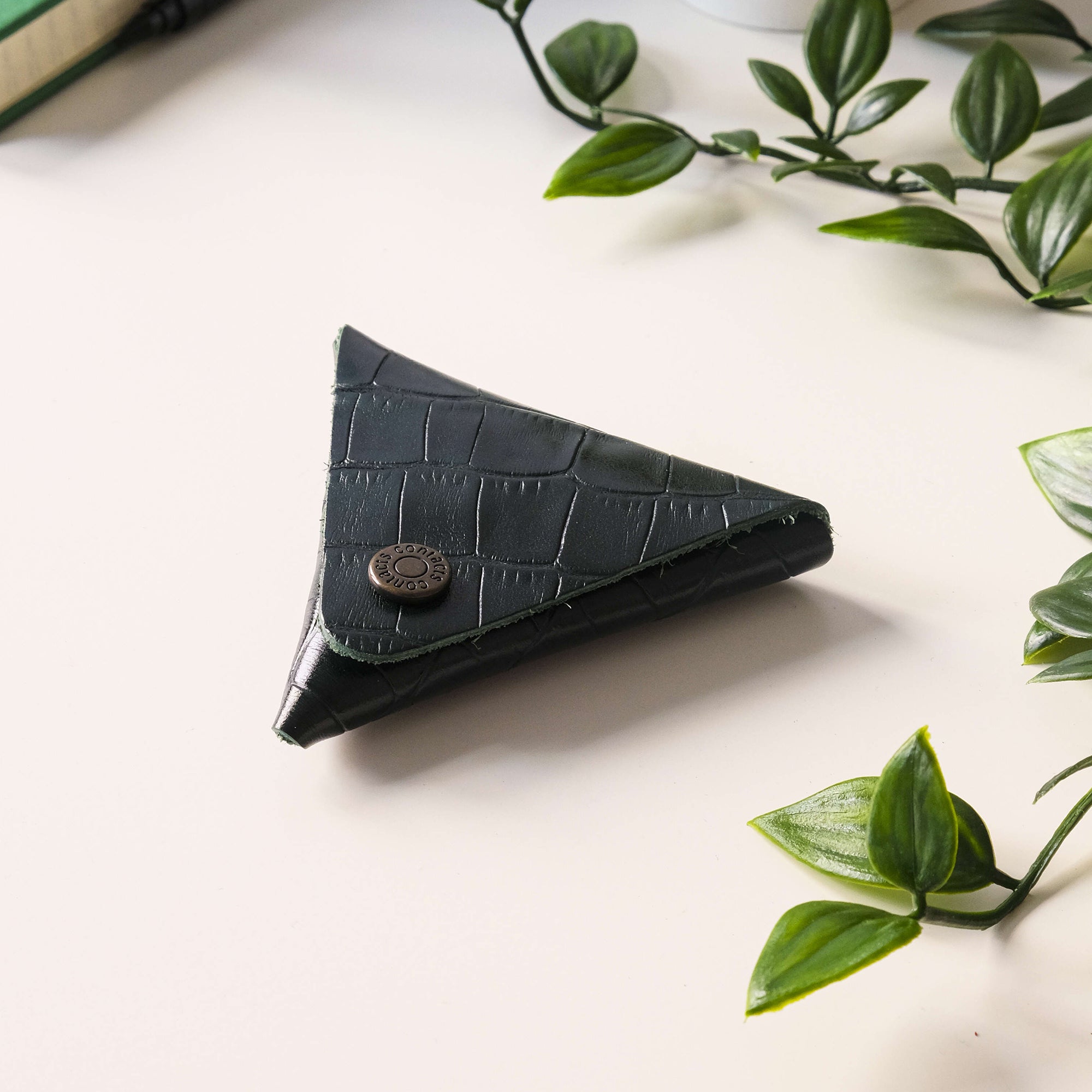 Bamby Genuine Leather Coin Pouch in various colors, showcasing its minimalist and stitchless design.