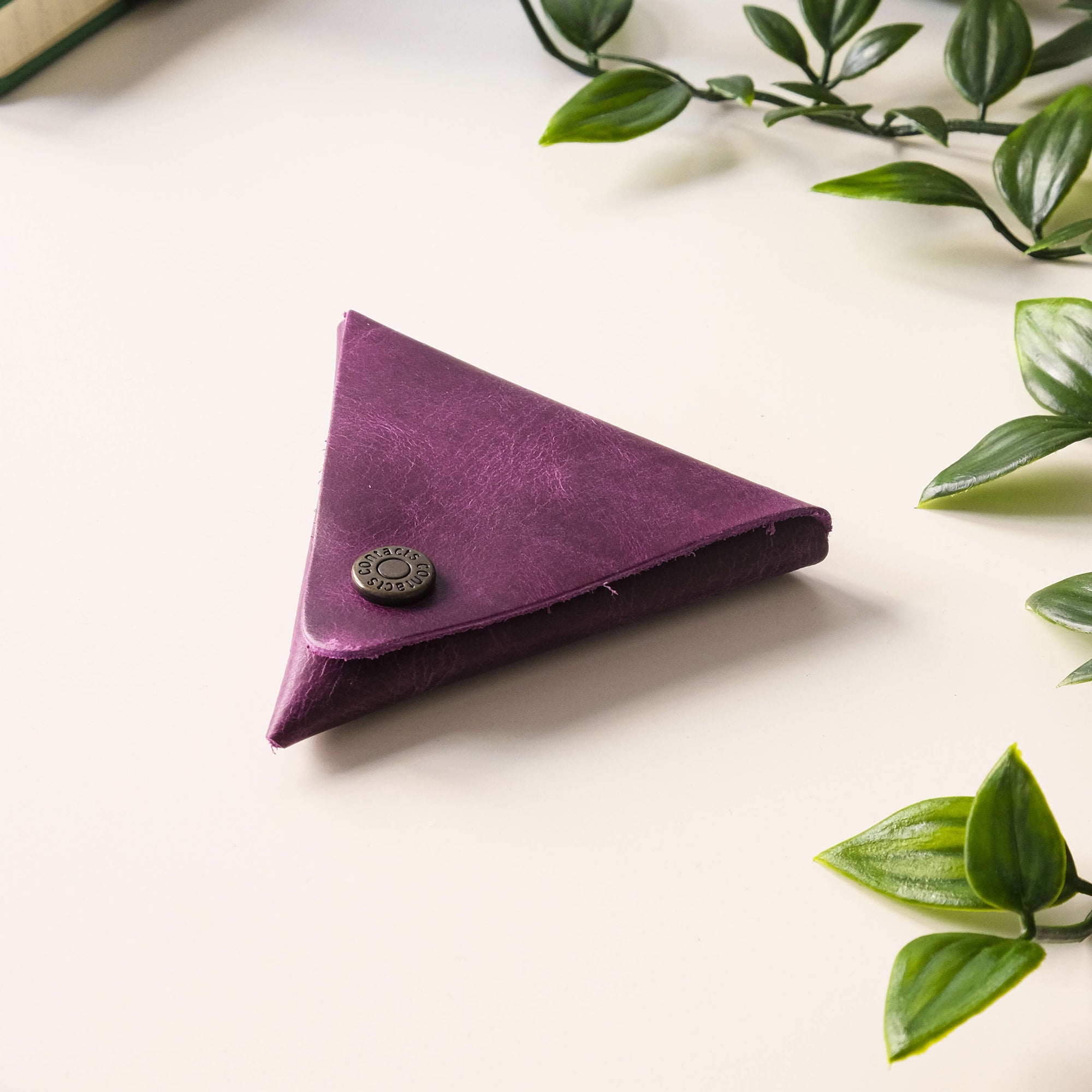 Bamby Genuine Leather Coin Pouch in various colors, showcasing its minimalist and stitchless design.