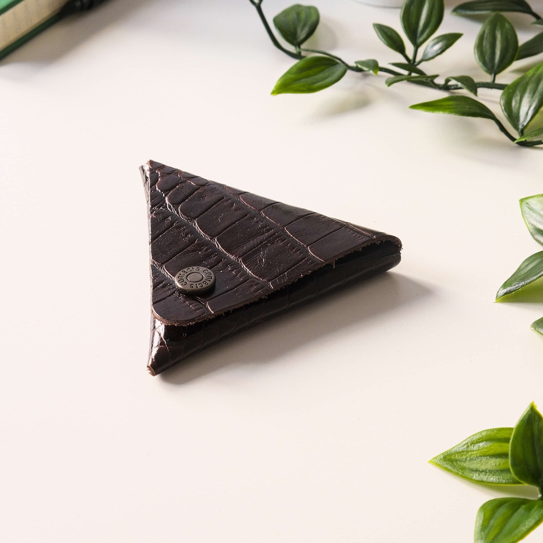 Bamby Genuine Leather Coin Pouch in various colors, showcasing its minimalist and stitchless design.