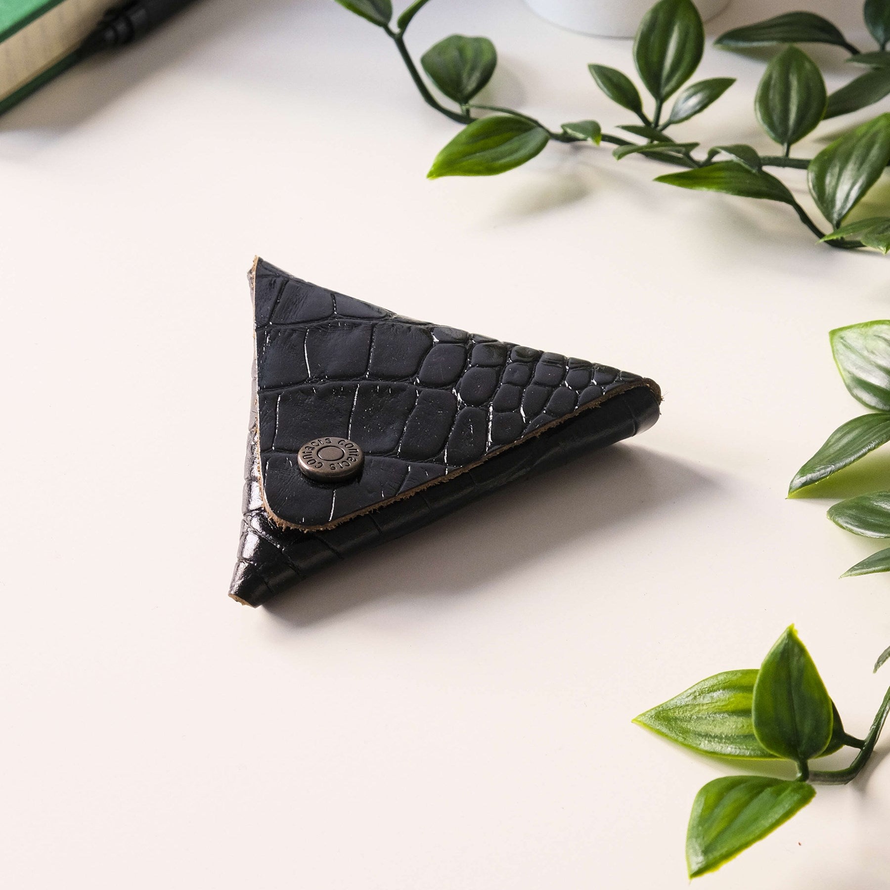 Bamby Genuine Leather Coin Pouch in various colors, showcasing its minimalist and stitchless design.