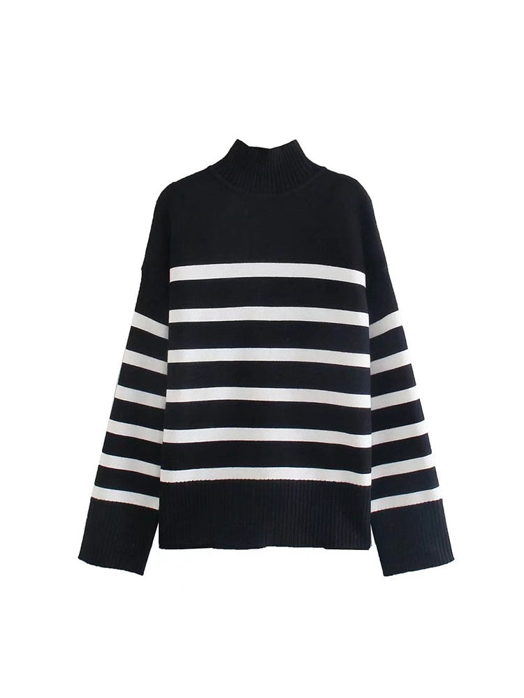 A stylish black and white striped knitted sweater with a turtleneck, perfect for autumn and winter wear.