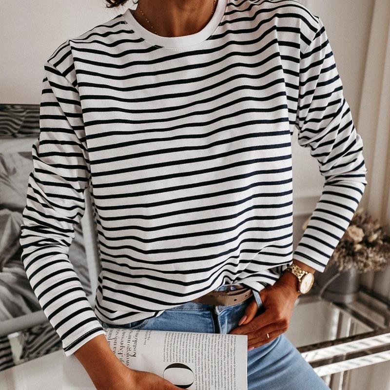 A stylish black and white striped shirt for women, featuring a loose fit and full sleeves, perfect for casual spring and autumn wear.