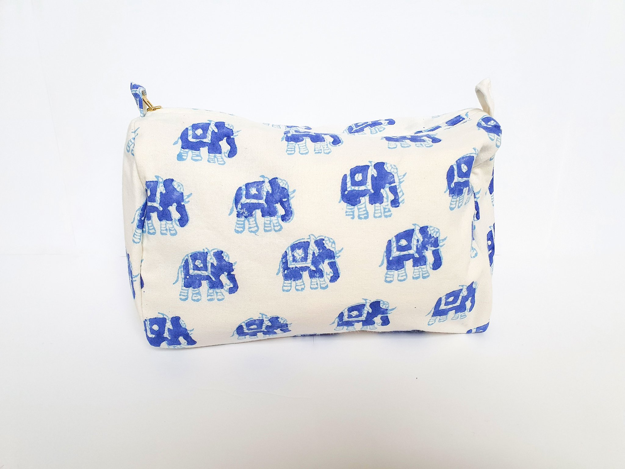 A colorful block-printed elephant toiletry bag featuring vibrant elephants on a cotton fabric, perfect for travel and organization.