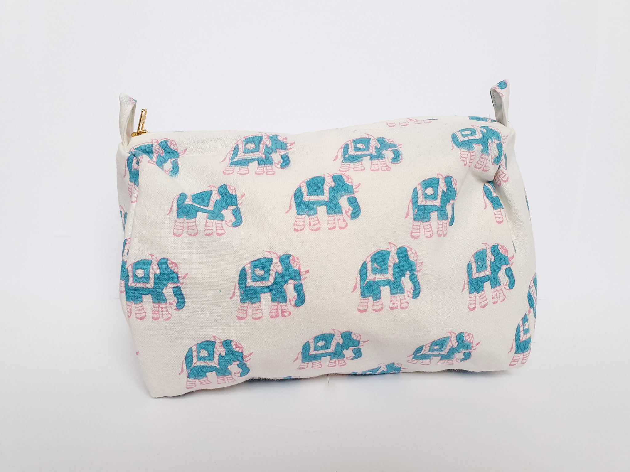 A colorful block-printed elephant toiletry bag featuring vibrant elephants on a cotton fabric, perfect for travel and organization.