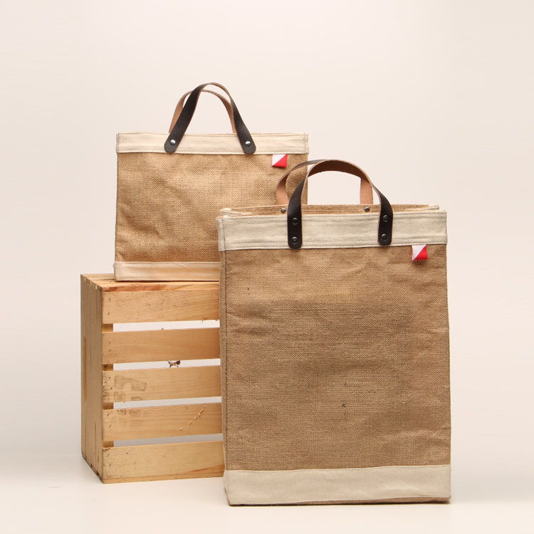 Bodega Jute Tote Bag featuring eco-friendly jute and canvas with leather handles, perfect for daily essentials.