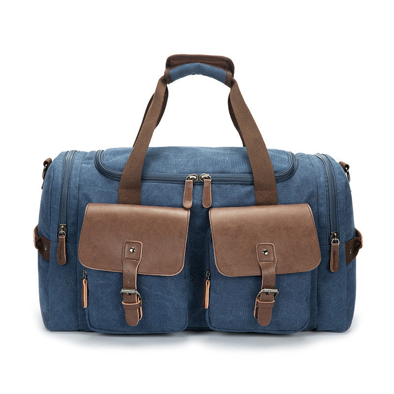 A versatile medium-sized canvas travel bag suitable for both genders, featuring a waterproof design and double straps for comfort.