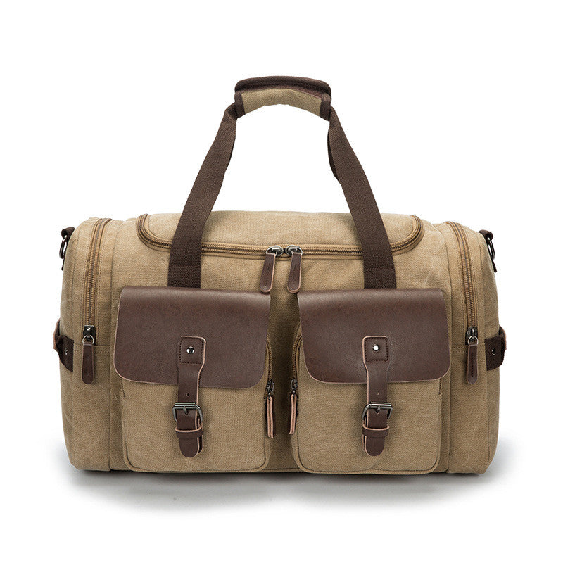 A versatile medium-sized canvas travel bag suitable for both genders, featuring a waterproof design and double straps for comfort.