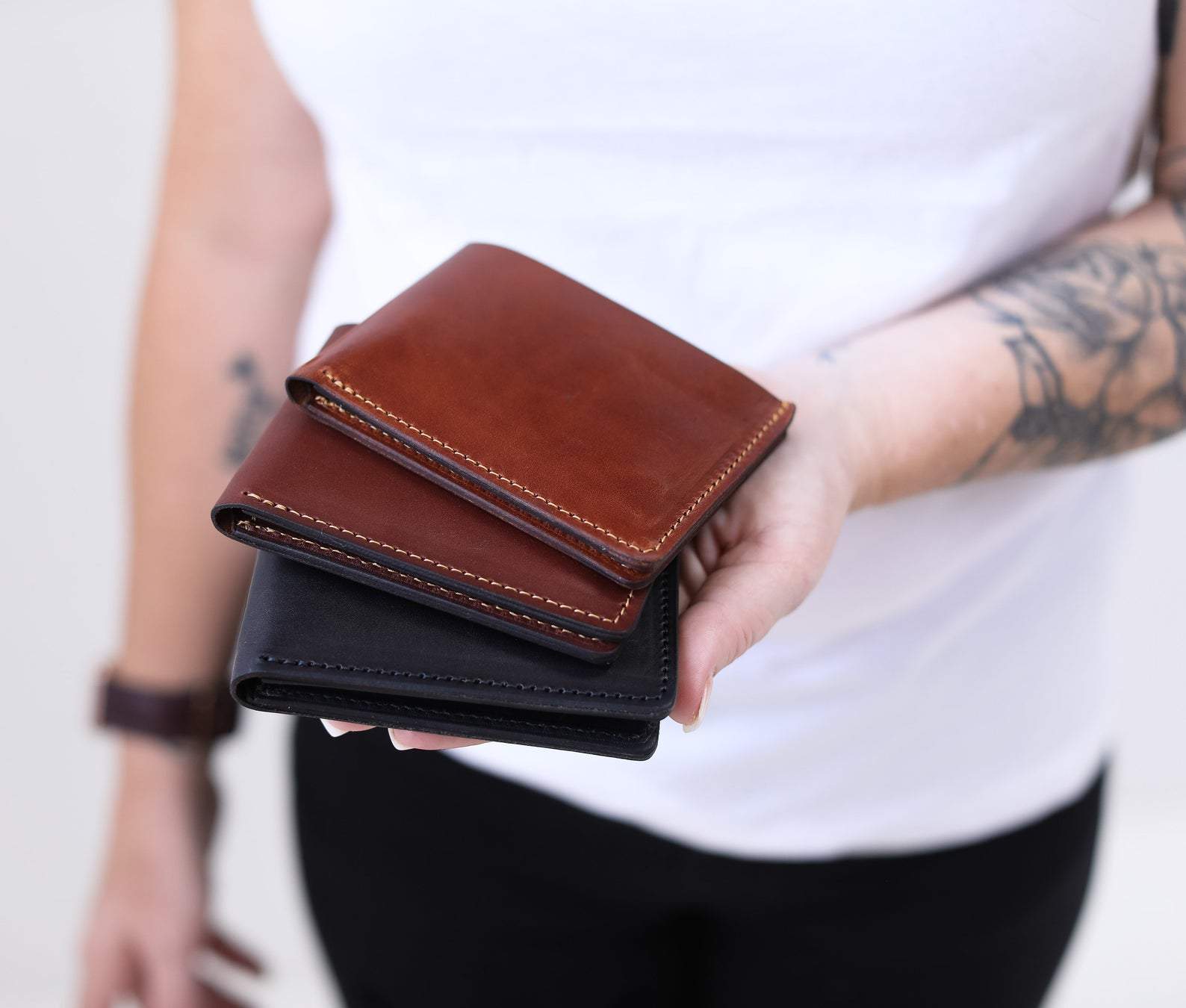 Bowman Bifold Wallet made from genuine full grain leather, featuring a classic design with personalization option.