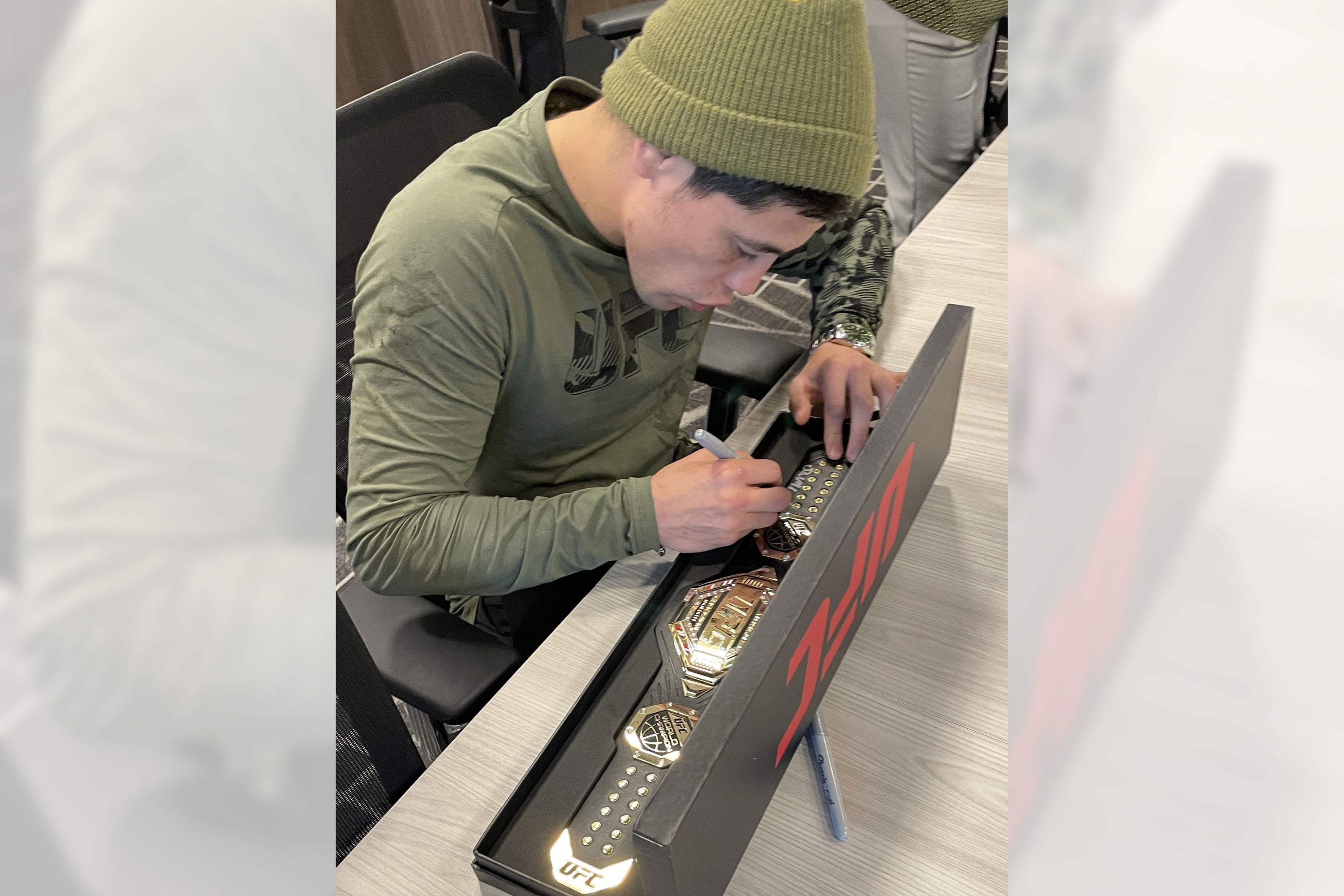 Brandon Moreno Signed UFC Legacy Championship Desktop Belt, showcasing intricate details and signature.