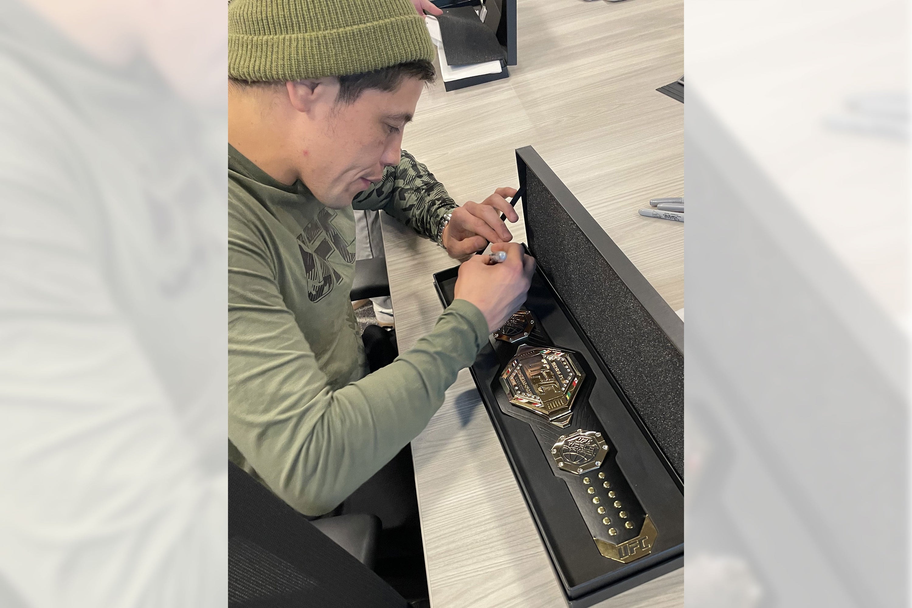 Brandon Moreno Signed UFC Legacy Championship Desktop Belt, showcasing intricate details and signature.