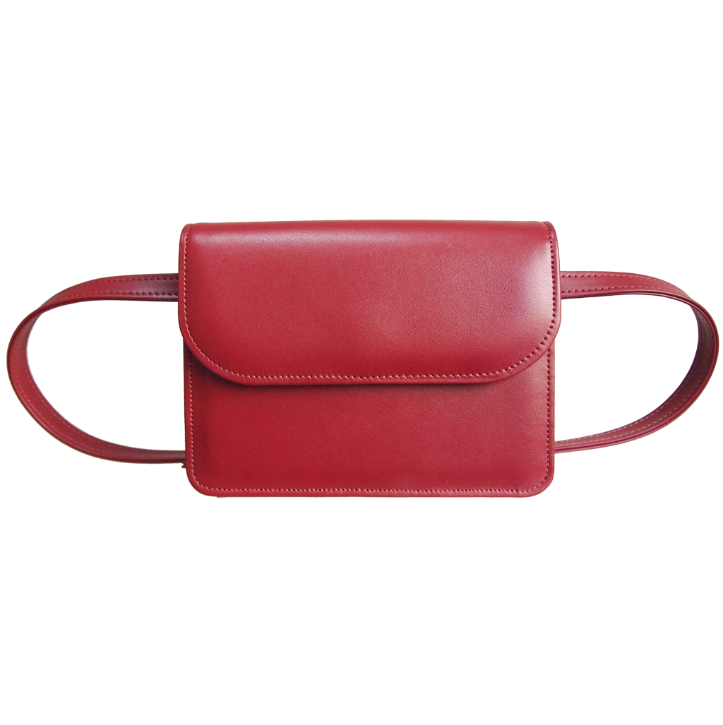 Buffed Leather Belt Bag in coral red, featuring a gold-plated buckle and pebbled calf leather finish, perfect for stylish wear.