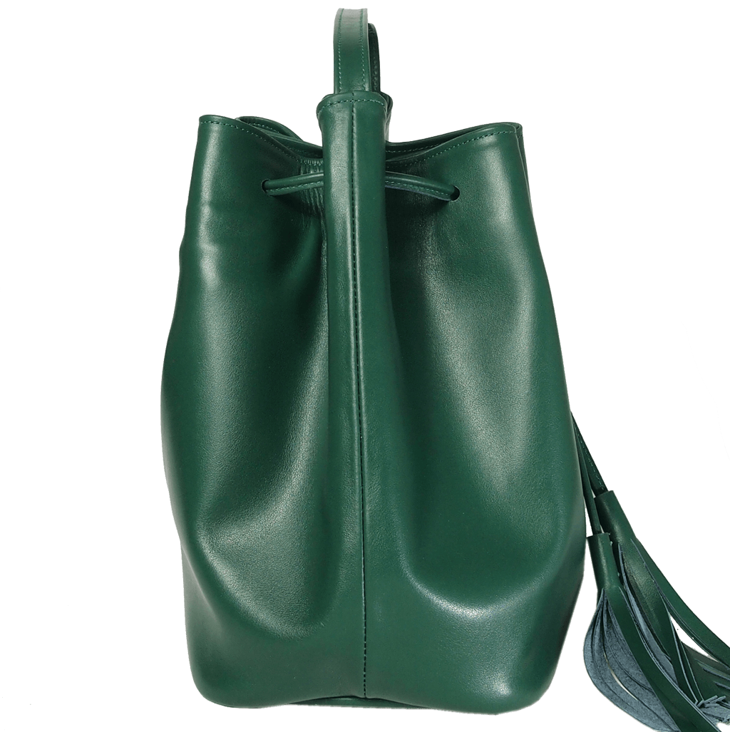 Emerald-green buffed leather bucket bag with fringed straps and gold studs, showcasing a spacious cotton interior and elegant design.