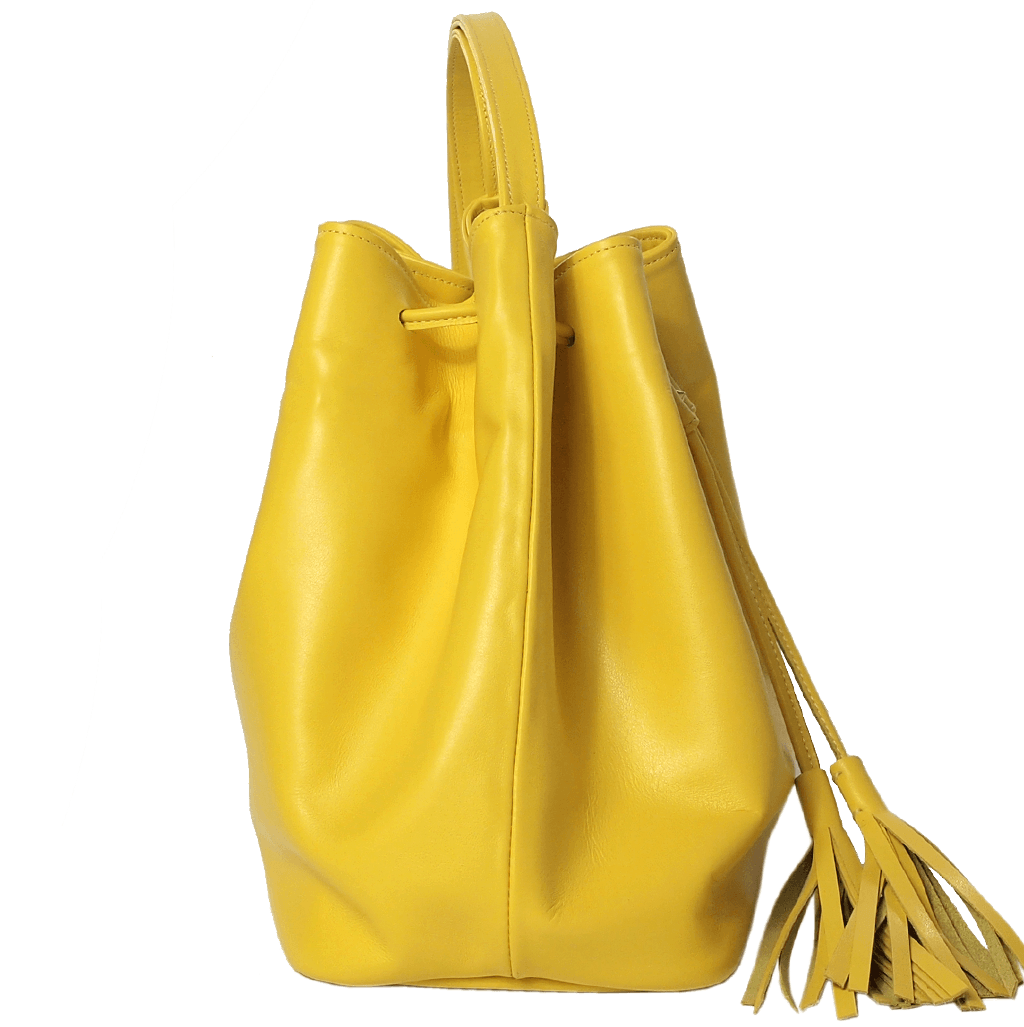 Buffed Leather Bucket Bag in Yellow with fringed straps and gold studs, showcasing its spacious cotton interior and elegant design.