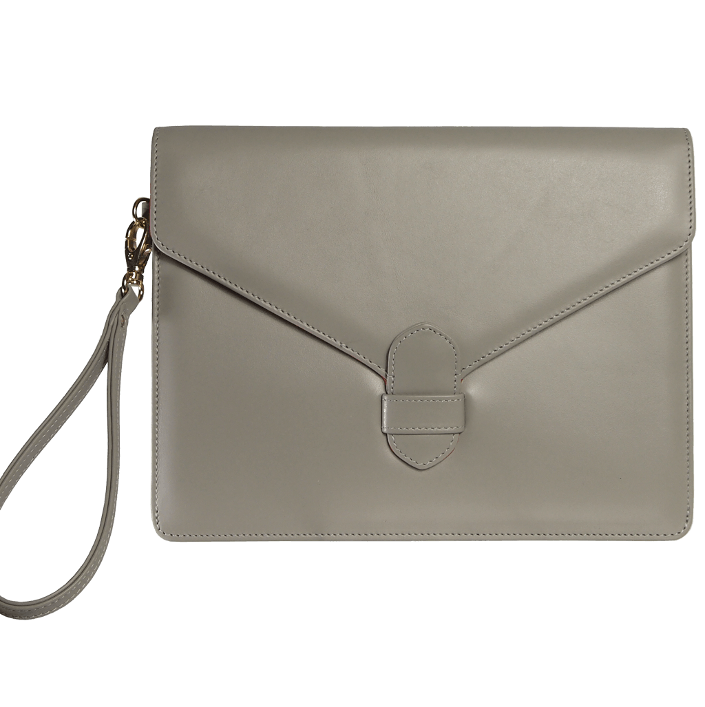 Buffed Leather Envelope Clutch Pumice made from Italian calf leather, featuring a hand-sewn leather strap clasp and a wrist strap for convenience.