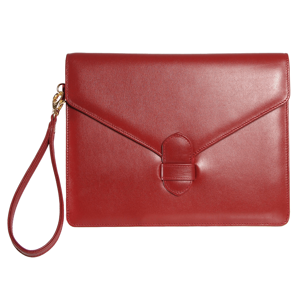 Buffed Leather Envelope Clutch in Ruby, handmade from Italian calf leather with a wrist strap and magnetic snap fastening.