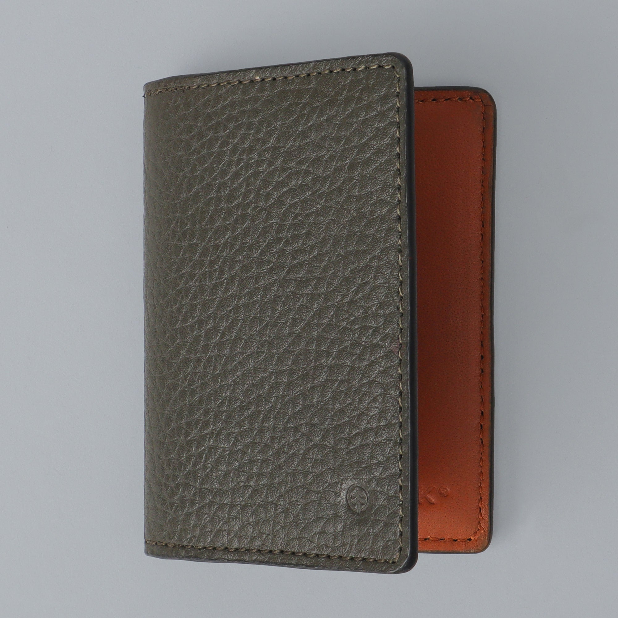 A premium Business Cards Leather Wallet made from full grain leather, featuring multiple pockets for business cards, showcasing its elegant design and craftsmanship.