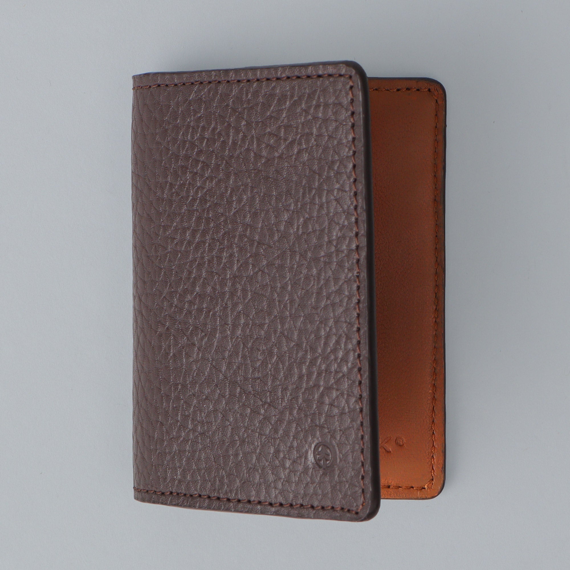 A stylish Business Cards Leather Wallet made from premium full grain leather, featuring multiple pockets for business cards.