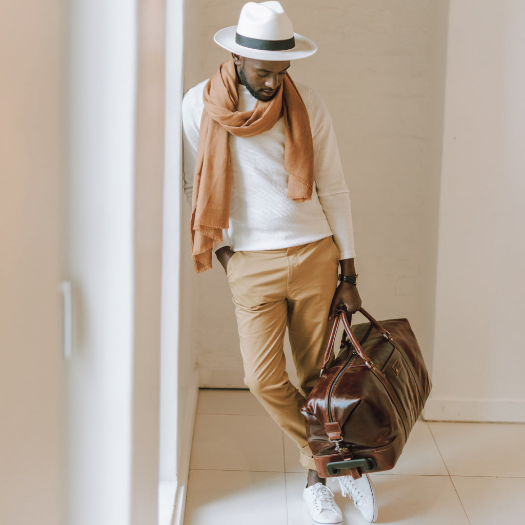 Cabin Wheeled Holdall 55cm in Tobacco color, showcasing its stylish design and durable wheels.