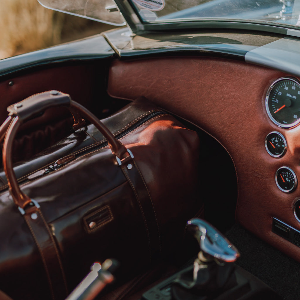 Cabin Wheeled Holdall 55cm in Tobacco color, showcasing its stylish design and durable wheels.