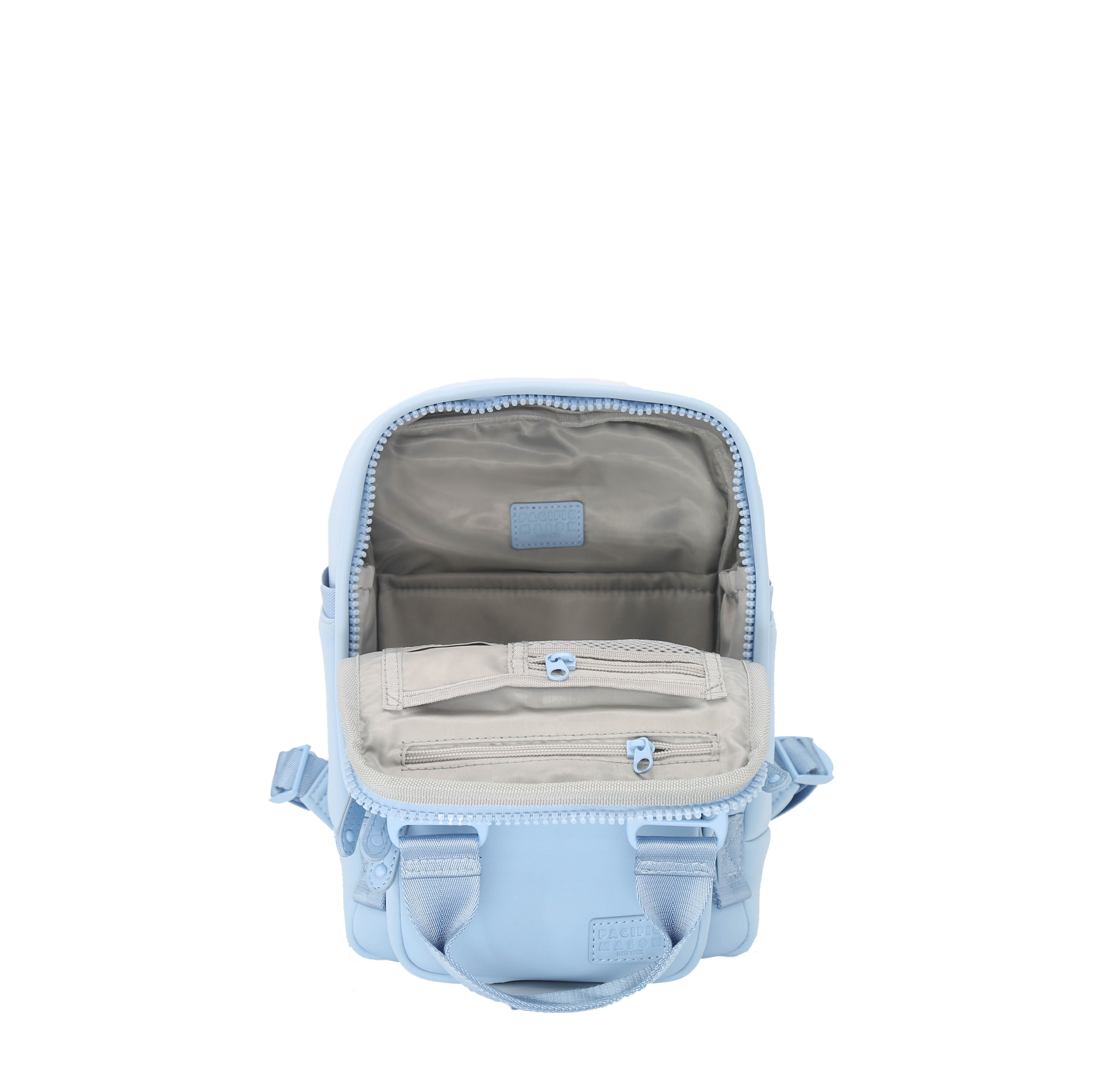 Cama Small Neoprene ELITE backpack in Powder Blue with leather details, showcasing its stylish design and organizational features.