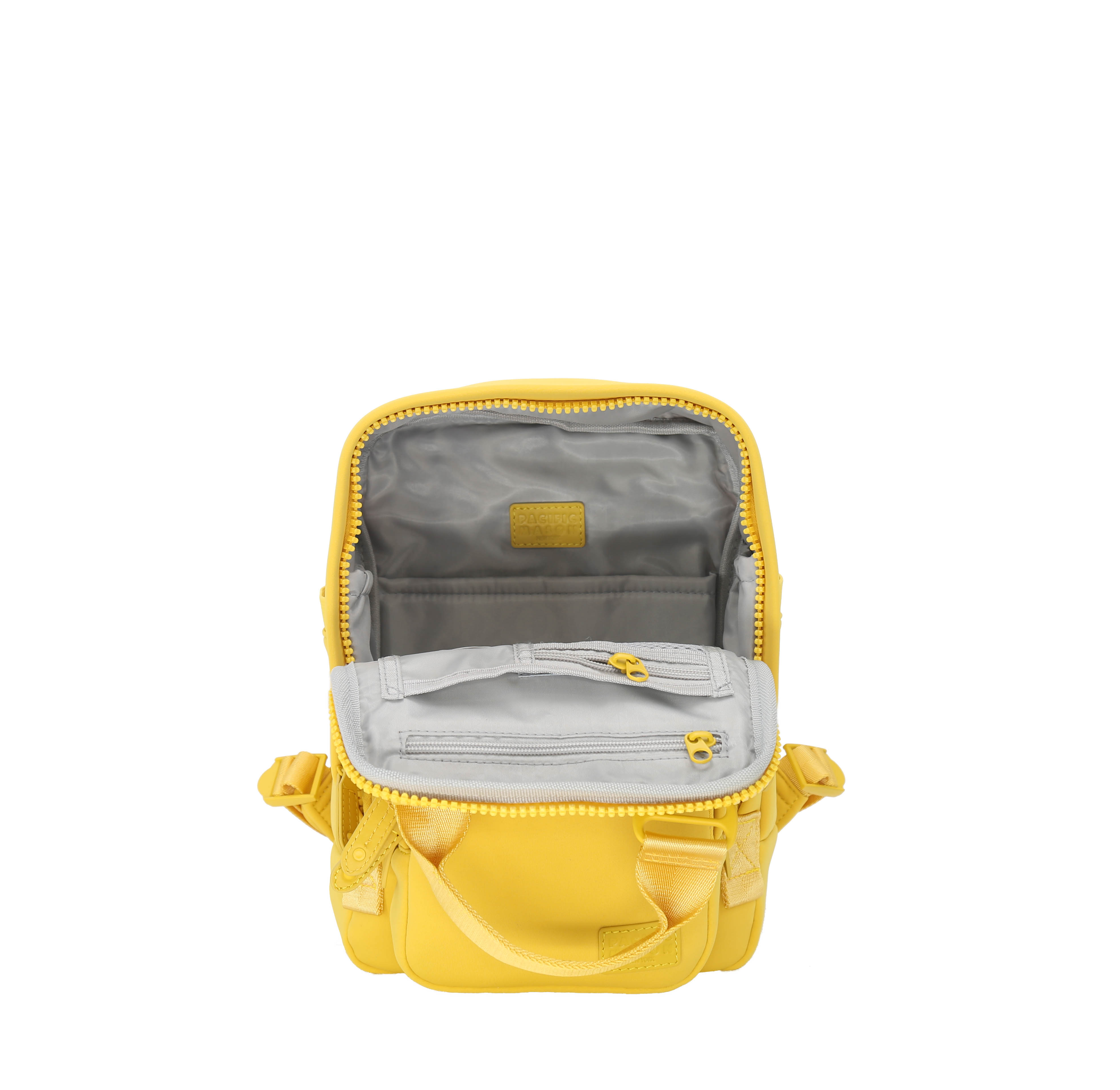 Cama Small Neoprene ELITE backpack in Spicy Mustard color, showcasing its compact design and multiple pockets.