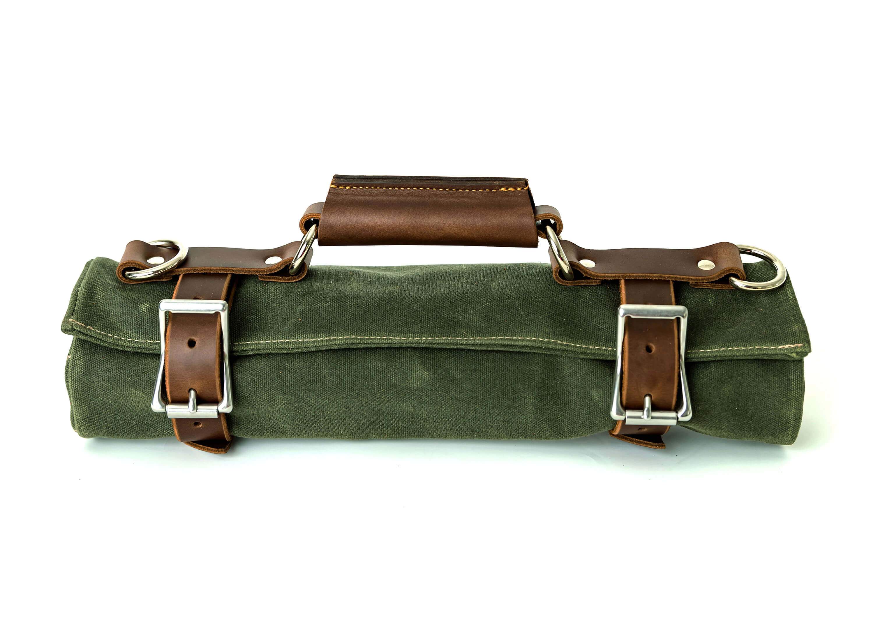 Canvas Tool Roll featuring waxed canvas and leather accents, designed to hold wrenches and tools securely.