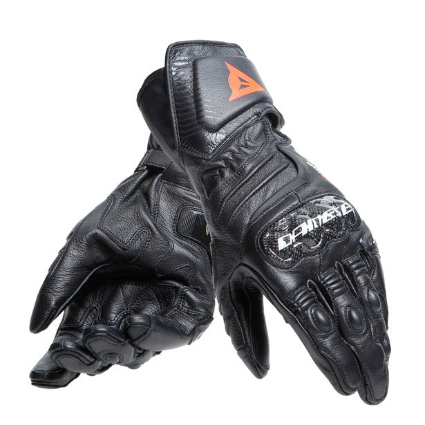 Dainese Carbon 4 long leather motorcycle gloves featuring ergonomic carbon knuckle protectors and goatskin construction.