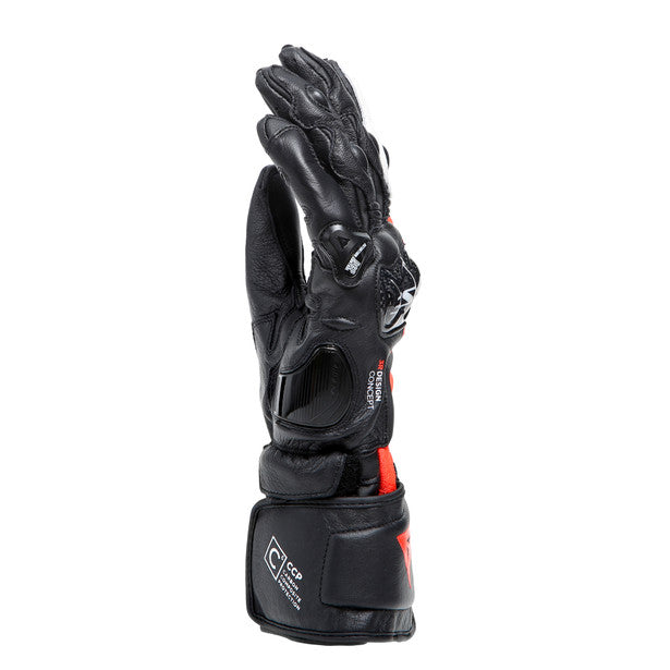 Dainese Carbon 4 long leather motorcycle gloves showcasing ergonomic design and carbon knuckle protectors.