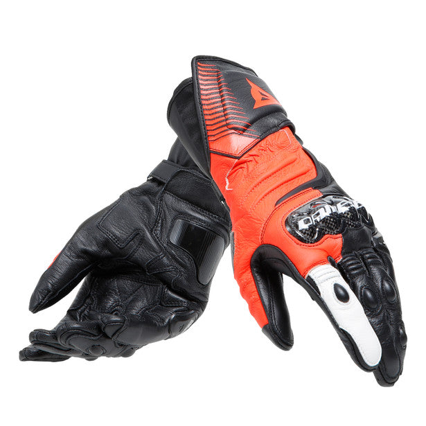 Dainese Carbon 4 long leather motorcycle gloves showcasing ergonomic design and carbon knuckle protectors.